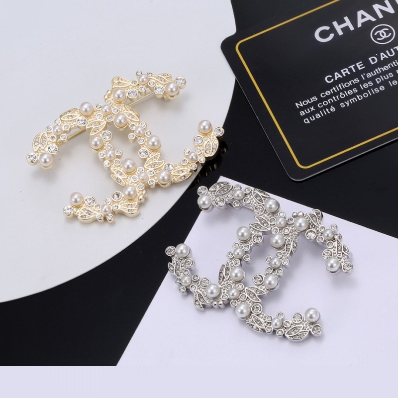 Ch*el brooches